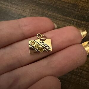 10kt solid gold pendant with yellow stones tested as diamonds